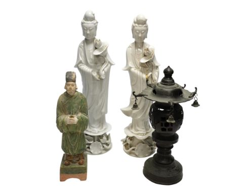 Two Chinese blanc de chine figures, a pottery figure and a metal incense burner, tallest item 35.5cm high. Condition - poor t
