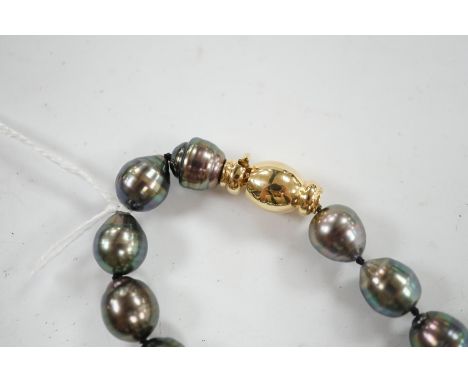 A modern single strand Tahitian cultured baroque pearl necklace with 750 clasp, 44cm. Condition - fair to good