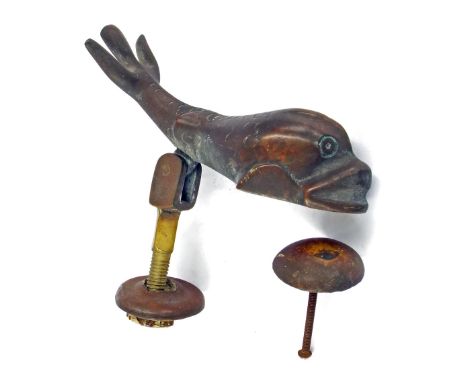 Bronze door knocker in the form of a dolphin with accompanying strike plate, both on 3" bolt for fixing, 7.5" long (2)