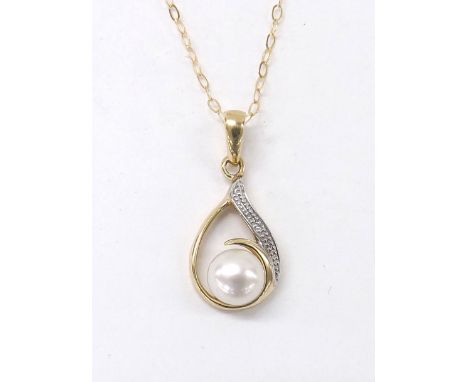 Cultured pearl and diamond pendant on a fine 9ct chain, the pendant 10mm wide