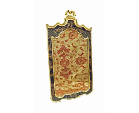 Decorative Georgian style ebonised and gilded wall mirror, the shaped bevelled mirror plate within a foliate surround depicti