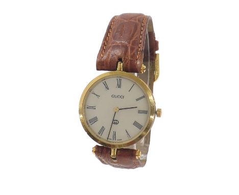 Gucci Classic lady's wristwatch, signed circular silvered dial with Roman numerals, champleve enamel case with glass back and