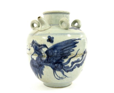 19th century Chinese blue and white porcelain wine jar, decorated to the sides with a dragon chasing the flaming pearl amidst