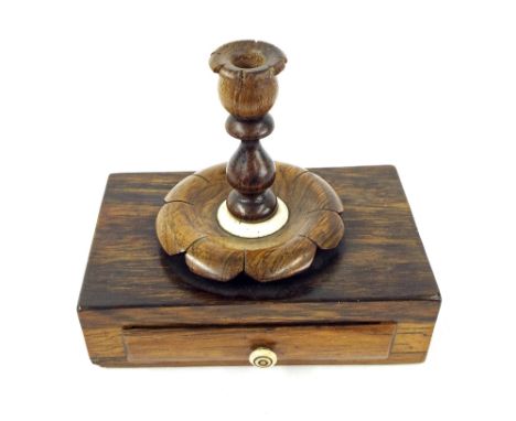 19th century rosewood candle wax holder, with a small taper stick on a box base with a small drawer, 4.75" wide, 4" high