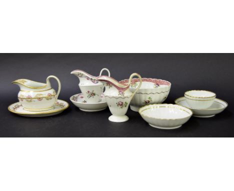 New Hall - three milk jugs in pattern nos. 369, 172 and 173; together with a teapot stand pattern no. 369, saucer pattern no.