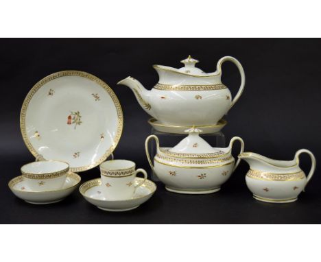 New Hall - tea set comprising teapot on stand, tea bowl on saucer, coffee cup on saucer, sandwich plate, milk jug and sugar b