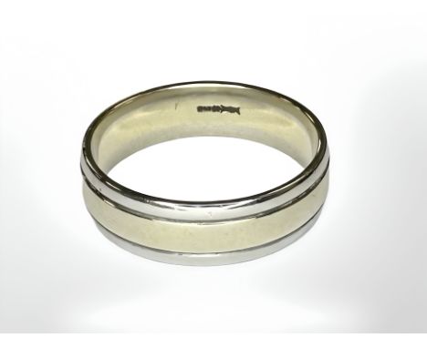 A 9ct two tone gold band ring, size R. CONDITION REPORT: 5.1g.