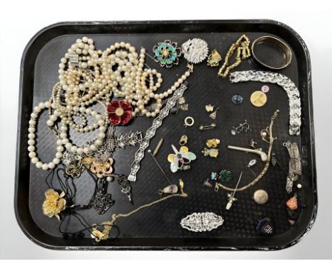 A group of vintage and later costume jewellery items, faux pearls, locket, bangle etc 