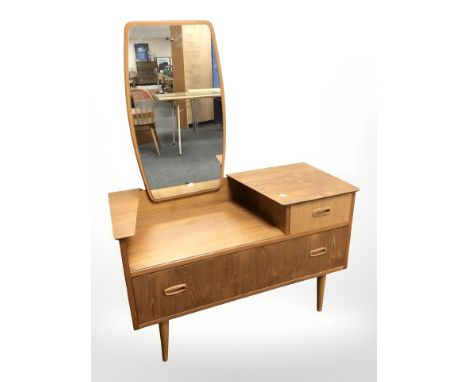 A Lebus teak sunk-centre mirror back dressing table, 97 cm x 42 cm x 123 cm 