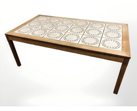 A 20th century Danish tile inset rectangular coffee table, 134 cm x 74 cm x 52 cm.