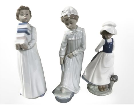 Three Nao figures, No. 231, 233 and 397, all boxed.