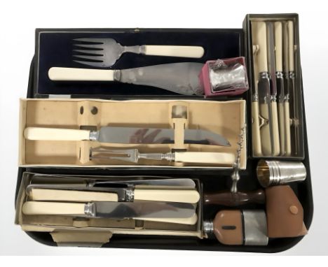 Several cases of cutlery, miniature hip flask, set of drinking tots, corkscrew, etc. 