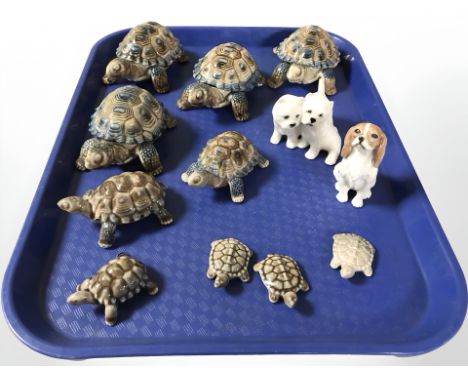 A group of Wade tortoises and Beswick dogs.