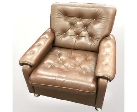 A late 20th century Danish button brown leather armchair on chrome feet, width 81 cm 