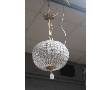 A CONTINENTAL STYLE PENDANT LIGHT the gilt brass foliate support issuing an open bead work and cut glass circular frame