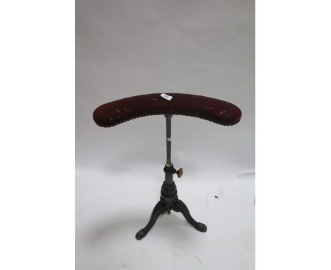A CAST IRON MUSIC SEAT, the demi-lune upholstered top on telescophic support with tripod base, enscribed, CH - Poyncet77cms x