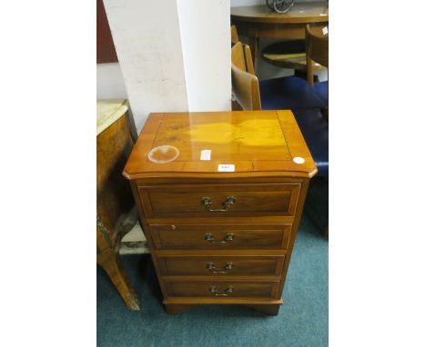 A YEW WOOD CHEST, of four long drawers on bracket feet, 74cms x 47cms x 32cms.