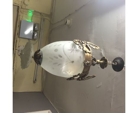 A GILT BRASS FROSTED GLASS AND ENGRAVED LANTERN, the reeded circlet with laurel wreaths and foliate swags. 