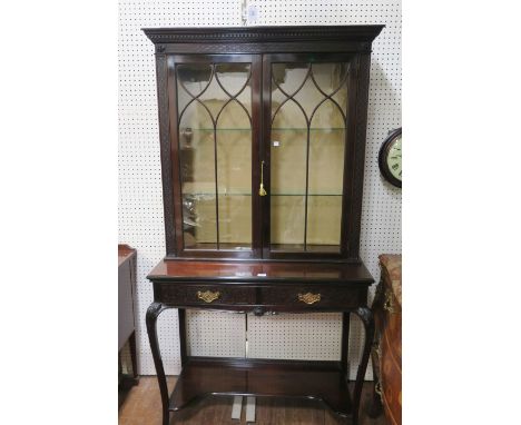 A GEORGIAN STYLE MAHOGANY FRAMED DISPLAY CABINET by Edwards and Roberts the moulded cornice with dentil frieze above a blind 