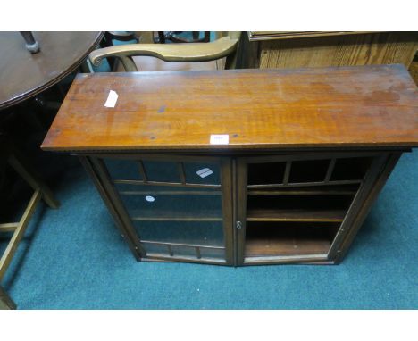 AN EDWARDIAN MAHOGANY WALL MOUNTED CABINET, with glazed door containing shelves, 70cms x 85cms x 27cms, (lacking one glazed p