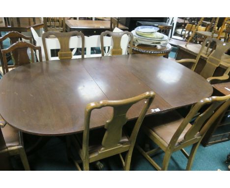 A SEVEN PIECE MAHOGANY DINING ROOM SUITE, comprising a regency style dining room table with one loose leaf on tripod support,