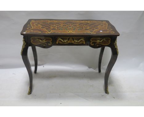 A CONTINENTAL STYLE KINGSWOOD AND MARQUETRY INLAID SIDE TABE, of rectangular form the top decorated with a foliate scrolled p