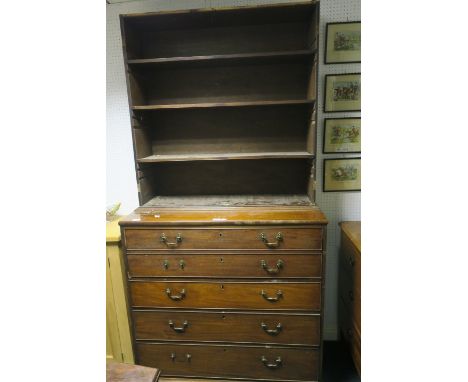 A GEORGIAN MAHOGANY SECRETARE LIBRARY BOOKCASE, the super searcher with open shelves above a deep secrator door, three long g