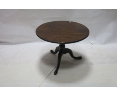 A GEORGIAN MAHOGANY OCCASIONAL TABLE, the circular top above a ballister column on tripod support 53cms x 68cms together with