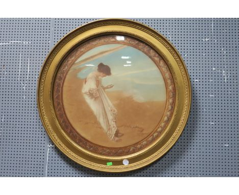 EARLY 20TH CENTURYCLASSIC FEMALE BY A SEASHOREA coloured print, circularIn a gilt frame 51cms x 51cms 