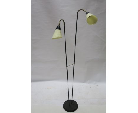 A VINTAGE TWIN HEADED FLOOR LAMP, c.1960, with original shades in cream glass and gold stars, on a black lacquered metal base