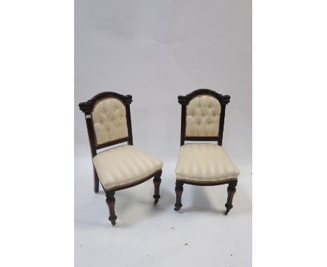 A PAIR OF MID 19TH CENTURY MAHOGANY CARVED DINING ROOM CHAIRS the rectangular ribbon carved back above a buttoned upholstered