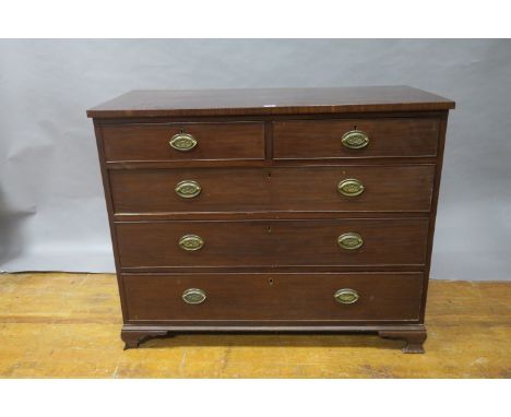 A GEORGIAN MAHOGANY CHEST OF DRAWERS, with two short and two long drawers on ogee bracket feet,97cms x 120cms x 55cms.