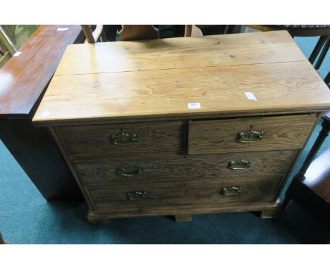 A PITCH PINE CHEST, of two short and two long drawers on bracket feet.
