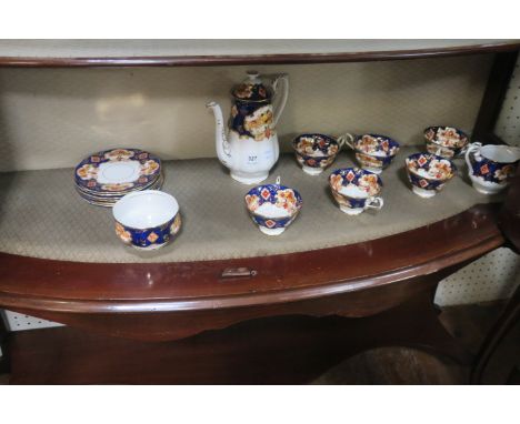 A ROYAL ALBERT  BONE CHINA TEASET (HEIRLOOM PATTERN), the white ground decorated with blue foliate filled borders with gilded