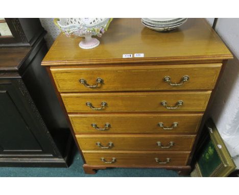 A MAHOGANY CHEST, with satinwood string inlay and five long drawers on bracket feet, 100cms x 76cms x 46cms.