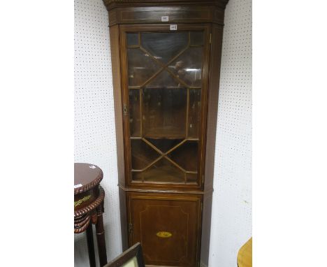 A GEORGIAN STYLE MAHOGANY AND MARQUETRY INLAID CORNER CABINET, the dentil cornice above a line inlaid frieze with an astragal