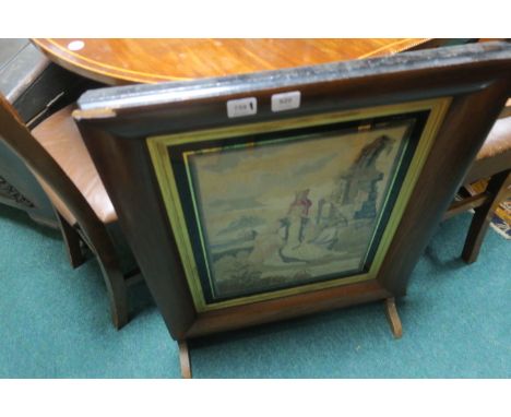 A ROSEWOOD FRAMED FIRESCREEN, c.1900, with tapestry insert depicting an Asian Prince80cms x 62cms.