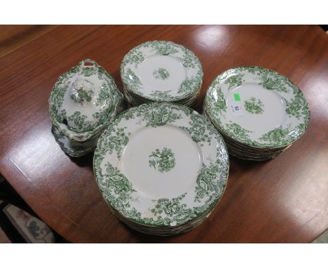A PART ROYAL STAFFORDSHIRE POTTERY DINNER SERVICE (arcadia pattern), the white background with foliate border and waved gilde