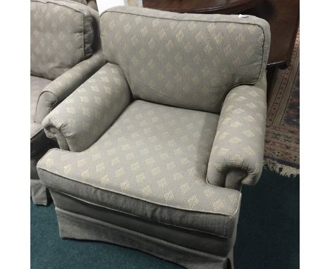 A PAIR OF LIGHT GREEN UPHOLSTERED ARMCHAIRS, each with loose cushions and scrolled arms.