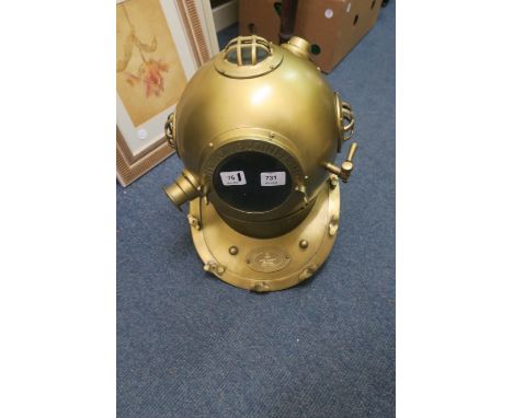 A BRASS FRAMED DIVER'S HELMET, engraved "Anchor Engineering".