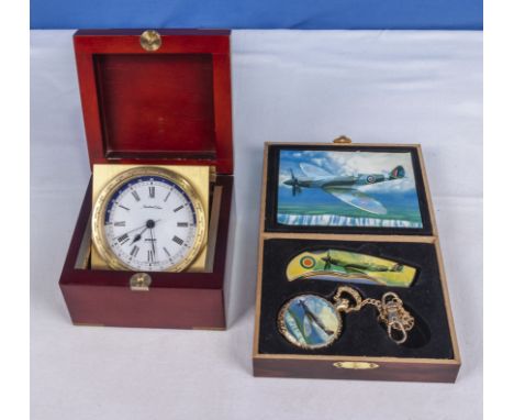 A penknife and key ring with aircraft design together with a clock