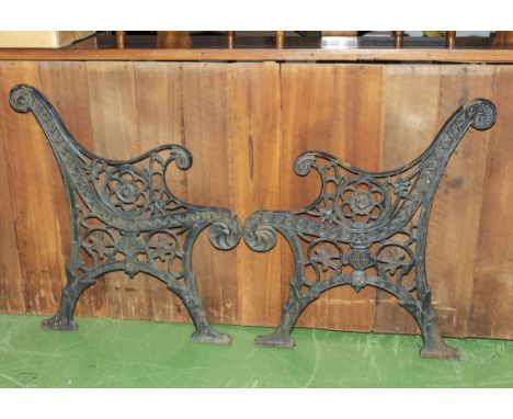 A pair of cast iron bench ends