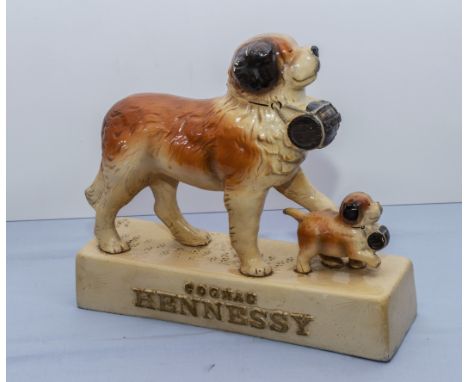 Hennessy Cognac pottery advertising figure group of two St Bernard dogs