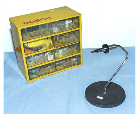 Fishing fly tying tool together with a box of accessories
