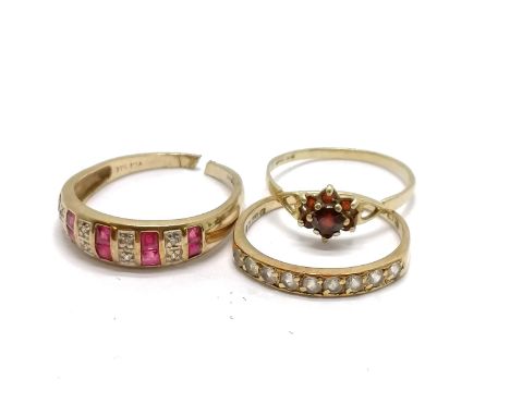 3 x 9ct rings - garnet (size M½), ruby / diamond (shank has been cut), white stone (size O½) - total weight 4.1g - SOLD ON BE