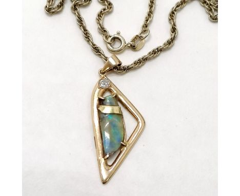 14ct (585) marked gold pendant set with raw uncut opal &amp; diamond on a 56cm silver gilt rope chain ~ pendant total weight 