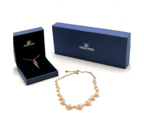 Swarovski mock pearl / crystal gold tone boxed necklace (42cm) t/w Swarovski red stone pendant on metal chain (a/f) 