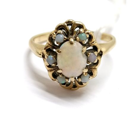 Unmarked gold opal cluster ring - size R½ &amp; 3.7g total weight. Has chip to centre stone 