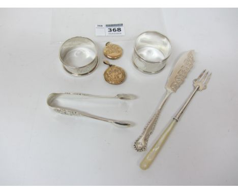 Two Victorian lockets 9ct gold front and back, two silver napkin rings, pickle fork, butter knife, pair sugar nips all hallma