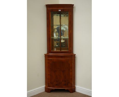 Yew wood corner display cabinet with mirrored interior enclosed by single glazed door, W65cm, H182cm  (This item is PAT teste